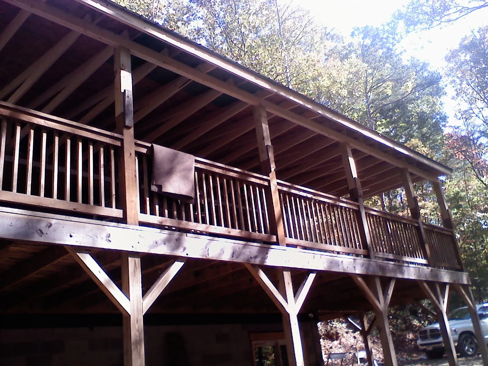 Timber framing under a new elevated porch and deck — Roof Leak Repair in Millbrook by Roofing Brothers